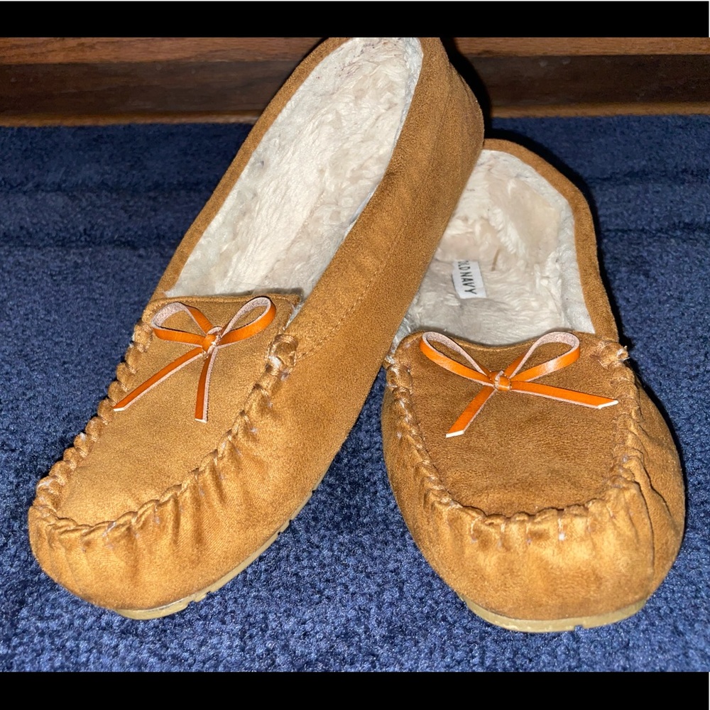 Brown moccasins with fur on the inside